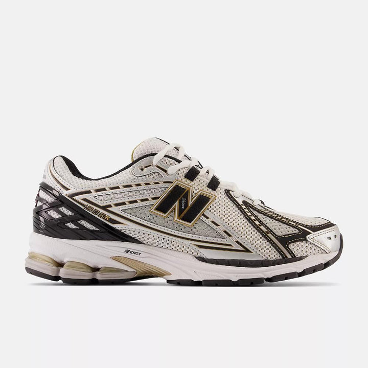 New Balance Sneakers 1906 nero oro